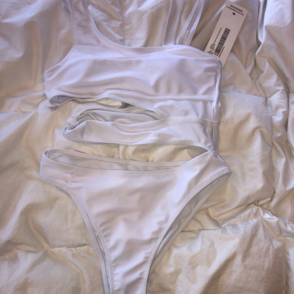 White one piece bathing suit never worn with tags